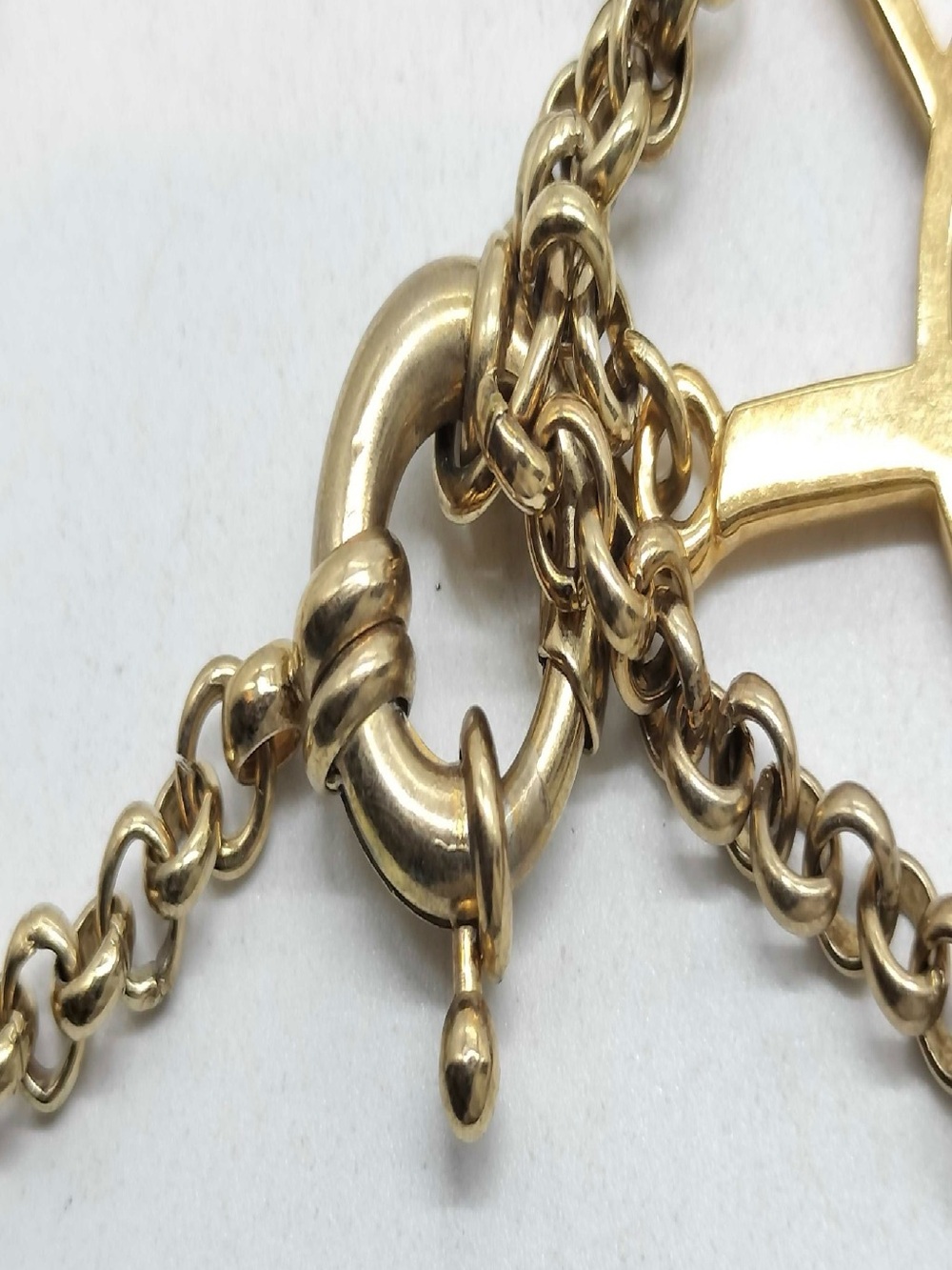 Yves Saint Laurent Gold-Tone YSL Logo and Clover Charm Bracelet - Picture 3 of 6
